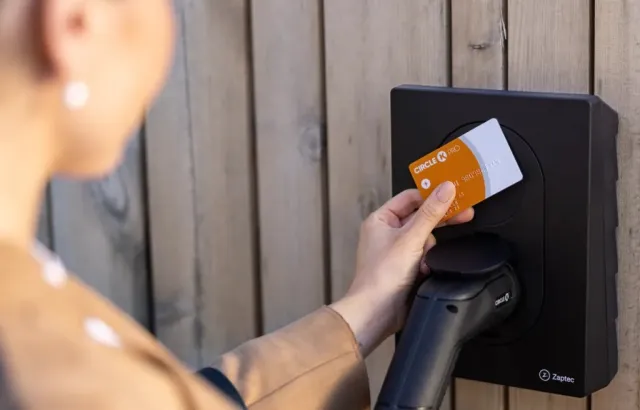 woman home charging using card